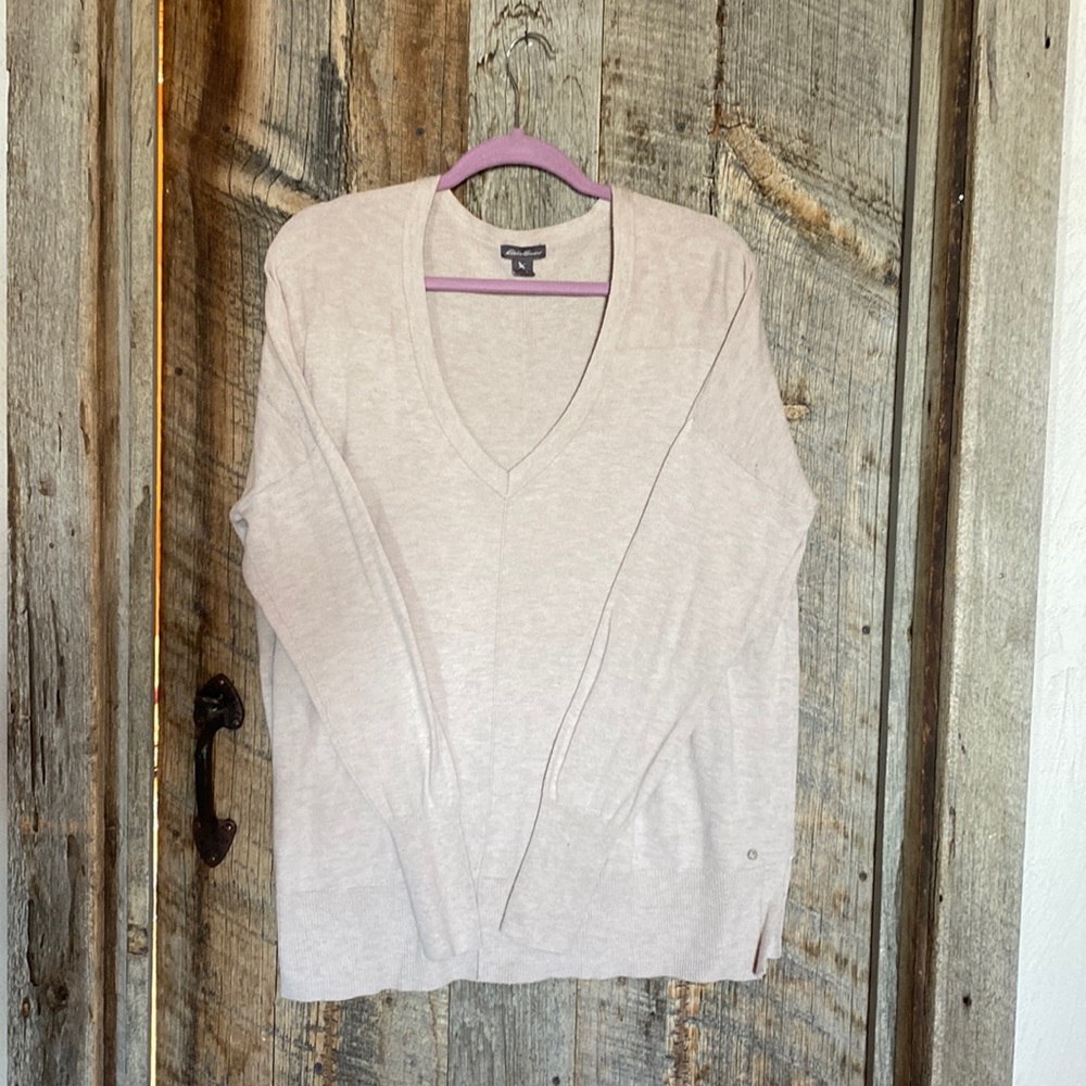 Eddie Bauer Women’s Large crème colored lighter weight v-neck sweater.